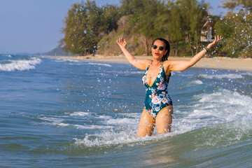 Woman body big with swimsuit relax at beach