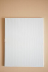 Black frame mockup hanging on wall 