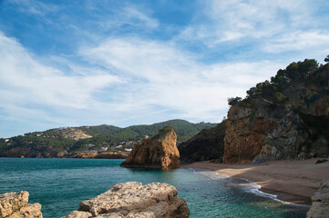 A view of the beach Cala Illa Roja in Begur, separated in two parts by a rock mass, on the Costa Brava, Catalonia, Spain.
