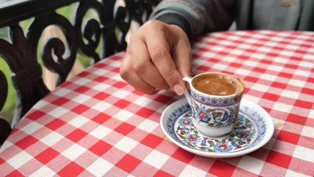 a cup of turkish coffee on table 