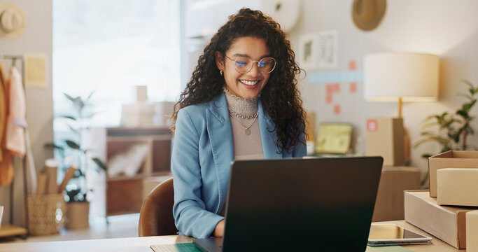 Happy woman, fashion designer and laptop in small business management or logistics at boutique store. Female person or entrepreneur working on computer for inventory or storage check at retail shop