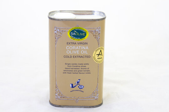 Johannesburg, South Africa - a can of extra virgin coratina olive oil from Babylonstoren isolated on a clear background with copy space