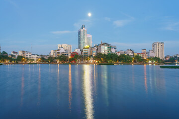 Fototapeta na wymiar Hanoi skyline cityscape in Ho Tay West Lake with lake and city buildings
