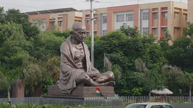mahatma gandhi statue with trees  at gandhi hospital hyderbad telangana