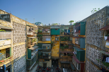Old and new residential buildings as an example of social stratification between rich and poor in Hanoi, Vietnam