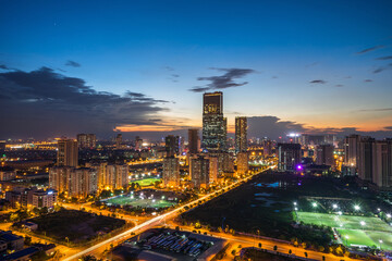 Fototapeta na wymiar Hanoi city skyline view by twilight period, Pham Hung street, Cau Giay district