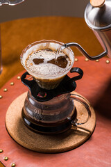pour over coffee,hand brewed coffee or Dripping Coffee,Coffee set, glass percolator, indoor studio light, close-up