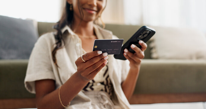 Happy woman, hands and phone with credit card for payment, online shopping or transaction in living room at home. Closeup of female person or shopper on mobile smartphone with debit for ecommerce