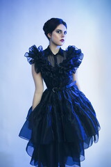 Cosplay girl in Wednesday Adams black dress