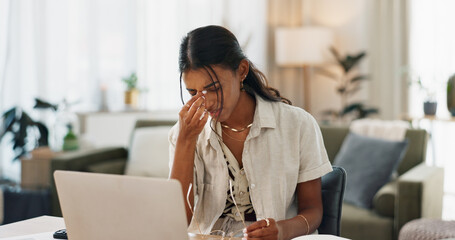 Woman, headache and work from home stress on laptop for marketing mistake, copywriting fail or...