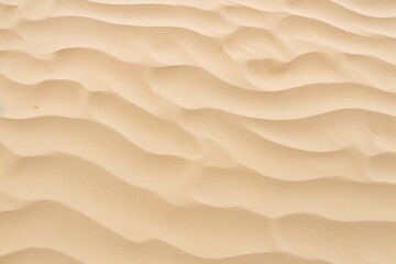 Closeup of sand pattern of a beach in the summer. - obrazy, fototapety, plakaty