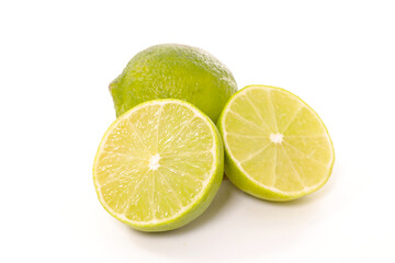 green lemon isolated on white background