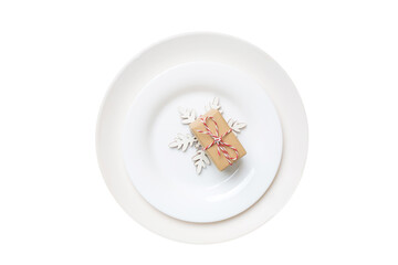 isolated christmas Plate with decor and fork and spoon. New year holiday background. Top view