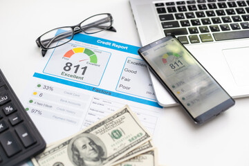 Credit score report with keyboard and pen