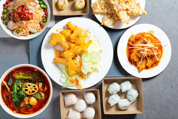 Sweet and sour pork, dim sum, and spicy noodles