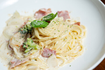Bacon cream sauce pasta on a plate