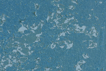 Old cracked paint on fence closeup. Texture, grunge texture, old cracked paint on fence close-up