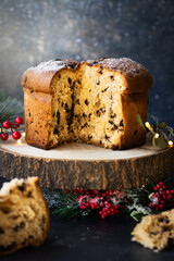 Traditional Christmas panettone with chocolate, with Christmas decoration