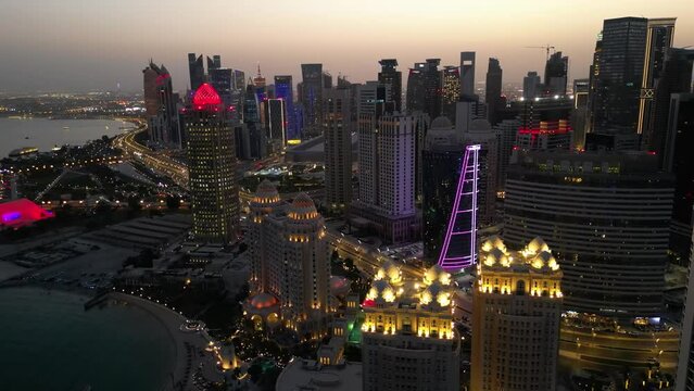 Skyscrapers at night in West Bay area of Doha (Ad-Dauha), capital of Qatar
