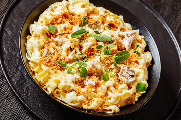 creamy chicken and mushroom tagliatelle in bowl