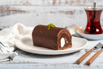 Chocolate cake. Delicious slice of cake on wooden background. patisserie products