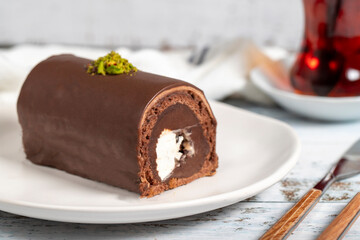 Chocolate cake. Delicious slice of cake on wooden background. patisserie products. Close up