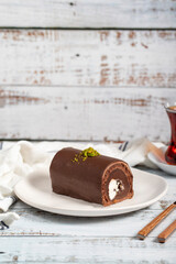 Chocolate cake. Delicious slice of cake on wooden background. patisserie products