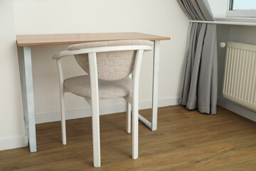 A beautiful chair in a modern apartment