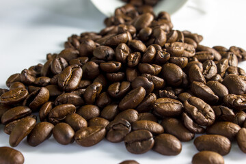 Exporting coffee beans is a good business. coffee beans on a white background