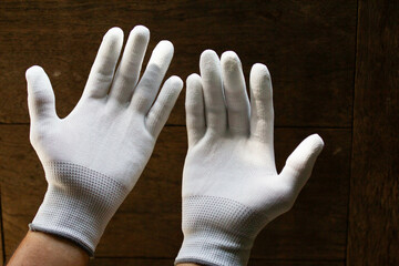 Gloves for cutting glass and sharp objects, rubber gloves, white gloves - obrazy, fototapety, plakaty