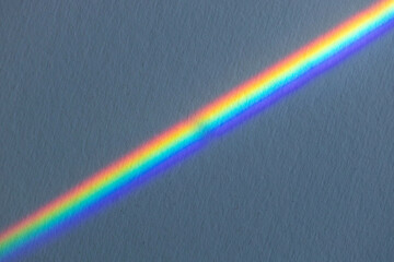 The glass reflects beautiful, colorful colors like a rainbow.