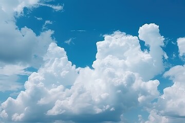 Naklejka na ściany i meble Large Cumulus clouds in blue sky