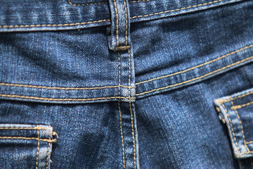 Fototapeta premium Jeans denim texture close up , focus only one point , soft blured background wallpaper