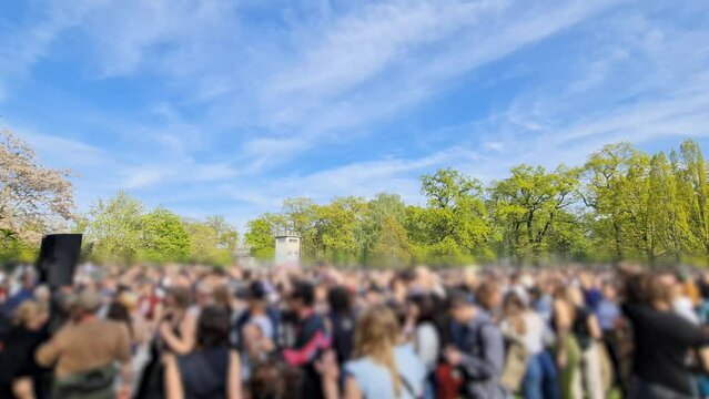 Crowd dancing in an openair techno rave party
