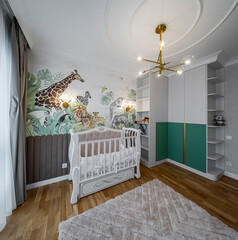 Kids room with animals on the wall.