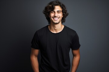 Fototapeta premium Young person in black tshirt smiling 
