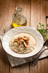 Rice with cep, traditional italian recipe - 664867976