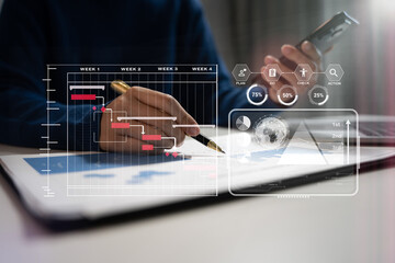 Project manager working and update tasks with milestones progress planning and professional...