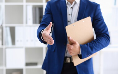 Hand cheerful man offer hand as hello in office closeup. Serious excellent prospect friendly support service introduction or thanks gesture gratitude invite to participate concept