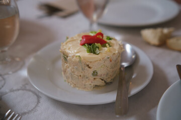 Traditional spanish russian salad with mayonnaise. Tapas food.