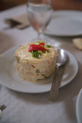 Traditional spanish russian salad with mayonnaise. Tapas food.