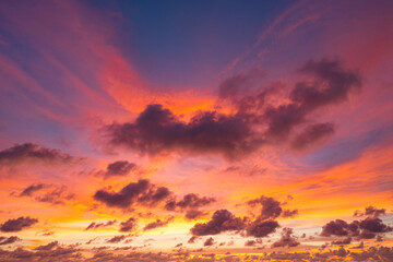 exotic pink red sky in sunset at Karon beach Phuket..Scene of colorful romantic sky sunset with changing the brilliant yellow sky gradually turned red. .beautiful sky of sunset in nature and travel 