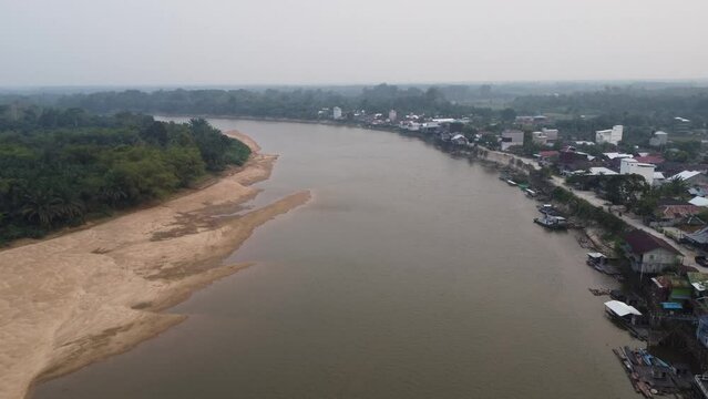 Beautiful aerial view of Pangkalan Bun during the day, you can see the urban buildings on the beach