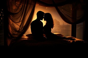 Silhouette of couple in bed at night time love erotic sunset. Male and female intimate evening...