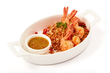 Roasted Shrimp with Chili and Garlic and spicy sauce in white plate isolated on white background.