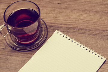 notebook on the table and coffee