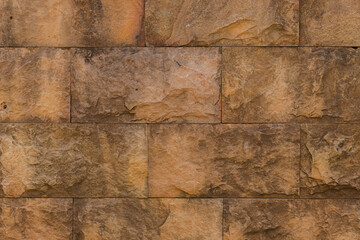 Dark old stone wall background, brick wall grunge texture close up