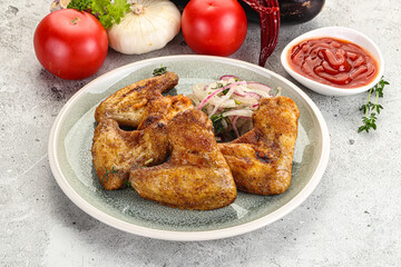 Grilled chicken wings with sauce