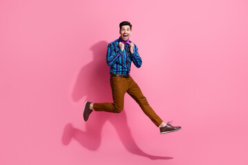 Fototapeta na wymiar Full body length photo of jumping happy guy touch his bow dress stylish vintage outfit classy clothing isolated on pink color background