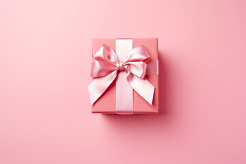 pink gift box with ribbon top view, Valentine's Day  - obrazy, fototapety, plakaty